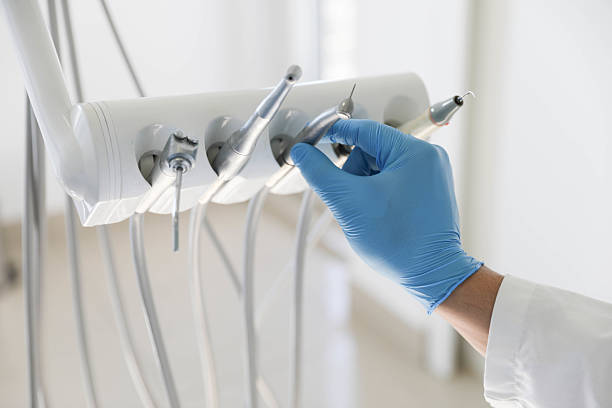 Professional Root Canal Treatment technician working in Laurie, MO